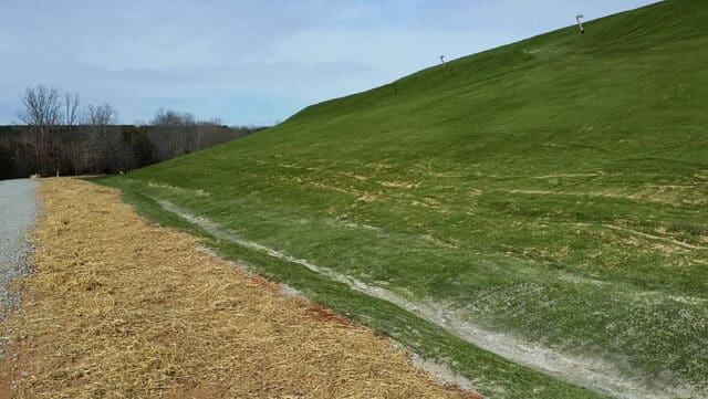 A photograph of a closed landfill
