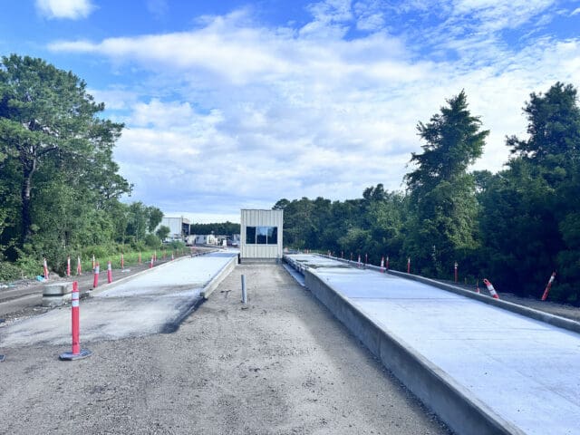 A photograph of a new scale house and scale at a transfer station