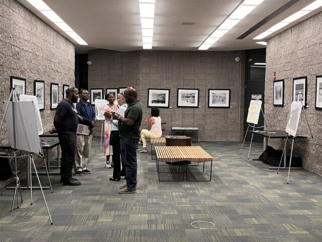 Members of the community attend a public workshop to learn about a revitalization project.