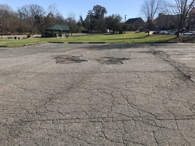 A deteriorated parking lot