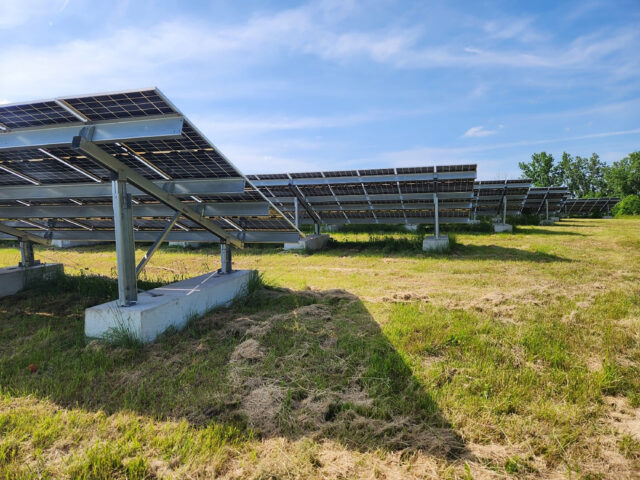 Solar panels installed using concrete ballasts. 