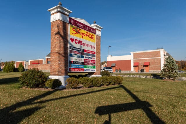 A photograph of the sign for the Hudson Heritage plaza