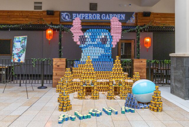 A structure built of canned goods in the shape of Stitch from the movie, Lilo and Stitch