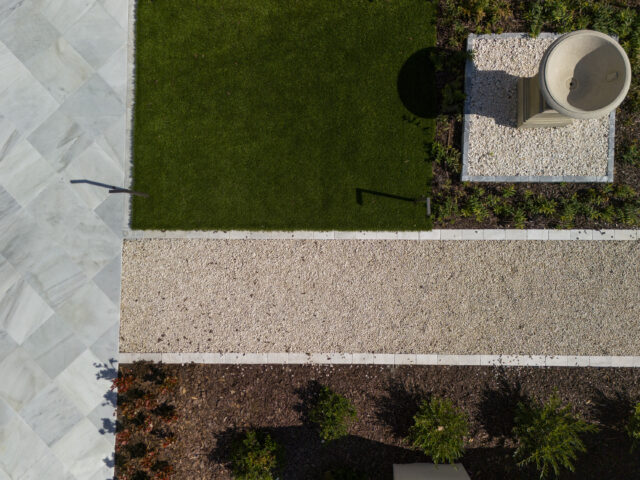 An aerial photograph of multi-media stone making up a driveway and walkway