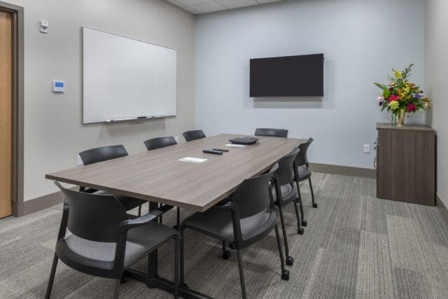 A photograph of a conference room at the Catholic Health LIFE Adult Day Center in Buffalo, NY