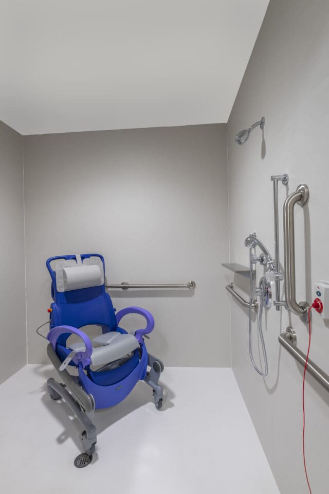 A photograph of an accessible and supportive shower at the Catholic Health LIFE Adult Day Center in Buffalo, NY