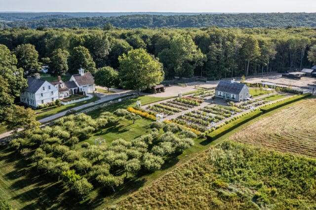 An aerial photograph of a cottage and gardens at Smith Farm Gardens venue in East Haddam, CT