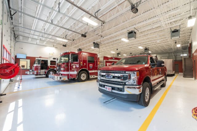 A photograph of the apparatus bays in the Great Sacandaga Lake Firehouse in Northville, NY