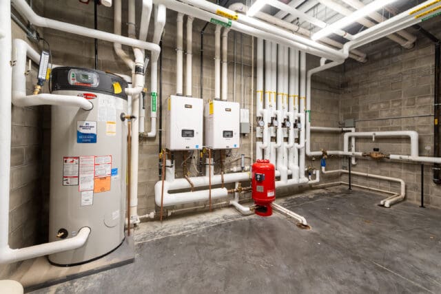 A photograph of a mechanicals room inside the Great Sacandaga Lake Firehouse in Northville, NY