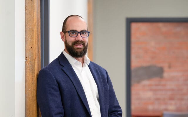 A professional headshot of Michael Cocquyt