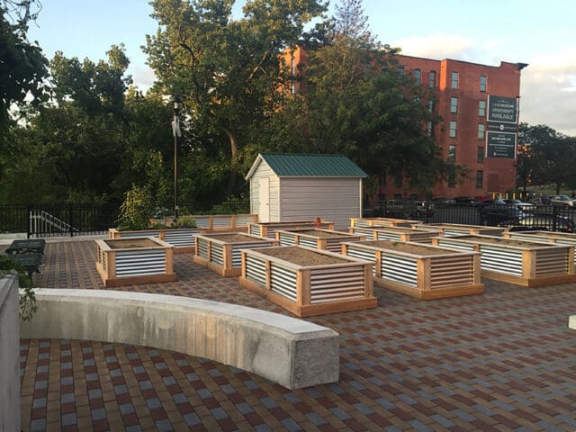 A photograph of community garden planters on the green roof of the Tapestry on the Hudson in Troy, NY.