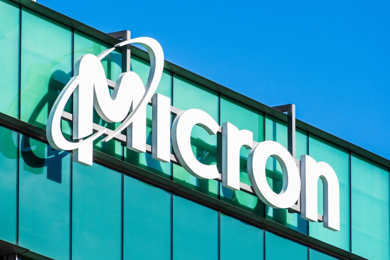 A photograph of the Micron logo on a building