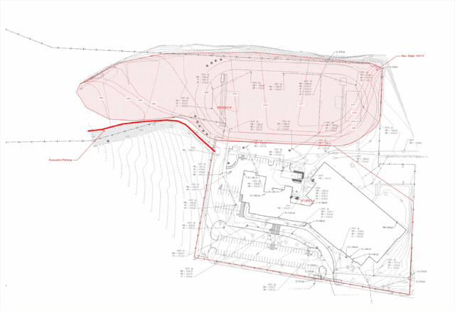 Engineering plans of a school and athletic fields, showing a floodplain area in red.