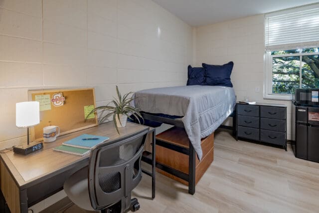 A photograph of a dorm room.