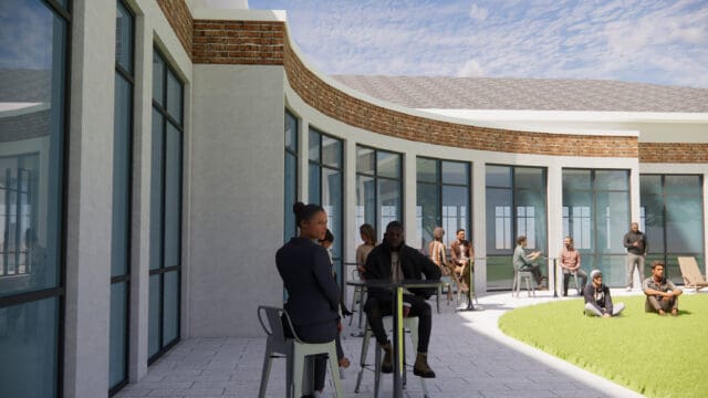 A simulation of people sitting at high-top tables outdoors along the perimeter of a curved building.