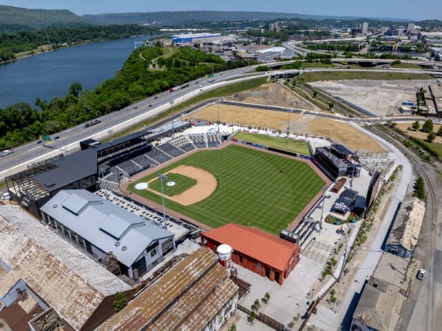 An aerial photograph of a baseball stadium called Erlanger Park. The Tennessee River is in the backrgound.