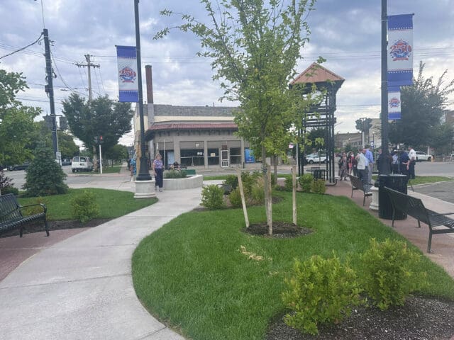 A photograph of a small park setting.