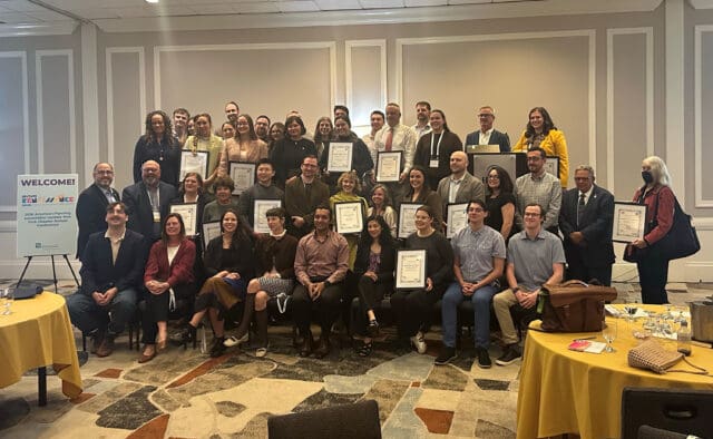 A photograph of a large group of people